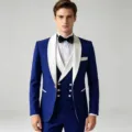Detail view of the elegant royal blue three-piece slim fit suit with contrasting white shawl lapel. - Sapphire Blue