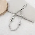 Silver heart beaded phone charm detail shot, metal love beads strap for mobile and bags. - CCB Beaded Heart