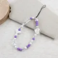Purple and white beaded phone charm strap detail showing crystal beads and heart pendant. - White Heart Letter Heart