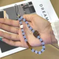 Blauwe en bruine kralen telefoonbedel riem met schattige kattenhanger in herfst winter stijl. - Kattenkoekje Lanyard