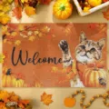 Autumn cat doormat detail view, showcasing vibrant pumpkin print and durable textured surface. - Cat-12