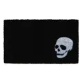 Detailed view of the black doormat featuring a striking white skull graphic for decor. - Wsj-7
