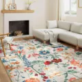 Vue détaillée du tapis de salon floral vintage dans un intérieur moderne et chaleureux. - 40x60cm / Tapis de Salon Paradis Botanique - Beige