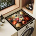 Detail view of the vintage floral washing machine top mat in a cozy laundry room setup. - 40*40cm Tech Fabric Rubber Base / Floral Pattern