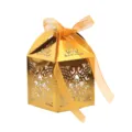 Goldene lasergeschnittene Hochzeits-Bonbonbox mit orangefarbenem Band für Party-Dekoration. - Reflektierendes Gold