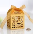 Gold laser cut wedding favor box, lovebird birdcage candy packaging for party celebration. - Golden Yellow