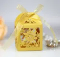 Elegant gold laser cut snowflake candy box with ribbon for wedding party Christmas gifts. - Gold