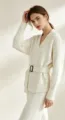 Detailed view of the women casual V-neck knitwear set with belt, featuring elegant style. - S / Top And Bottom / White