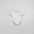 Cute baby summer romper with colorful dots contrast trim short sleeve cotton bodysuit detail view. - 66cm / White
