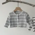 Detail view of baby ribbed striped cardigan, soft knit fabric, cozy neutral aesthetic hanging. - 66 / Tops / Grey and White Striped
