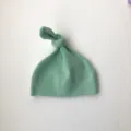 Cute light green baby top knot hat, soft newborn beanie cap with adjustable knot design. - One Size / Light Green Hat