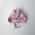 Cute pink baby bonnet with tie straps and sweet little pom-poms for newborn infants. - One Size / Light Pink Pom-Pom Hat
