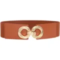 Close-up view of the elastic waist belt showing the shiny gold double ring buckle detail. - Camel