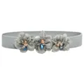 Close-up detail of grey elastic waist belt with three fabric flower crystal beads. - 3 Flowers - Color 5