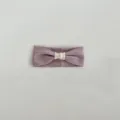 Infant purple knitted headband with soft white bow knot, comfortable baby hair accessory. - Taro Purple Headband