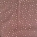 Detailed view of a brown fabric featuring cute pink star patterns, perfect for cozy aesthetic desks. - Brown (SZBA169207)