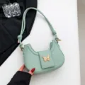 Mintgrüne Schultertasche Underarm Tasche mit schickem goldenen Schmetterling Metallverschluss - Grün
