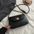 Schwarze kleine Umhängetasche für Damen, Retro PU Leder Crossover Tasche mit Drehverschluss. - Schwarz