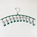 Curved metal clothes drying rack with 10 clips for socks, underwear and small items daily use. - Dark Green
