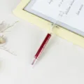 Kreativer Spritzen-Textmarker mit keilförmiger Spitze, transparentem Design und Tinte. - Keilspitze / Rot