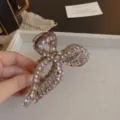 Rhinestone bow hair claw clip detail shot, elegant purple sparkling crystal hair accessory. - 11cm