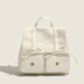 Sac a dos femme en cuir PU blanc elegant avec pochettes avant et poignee vue principale - Blanc Cassé