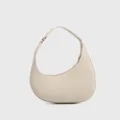 Chic off-white crescent shoulder bag for women, trendy minimalist hobo underarm design. - Off White
