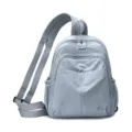 Light grey nylon mini backpack, compact multi-pocket casual school bag for women daily commuting. - Light Blue