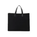 Black suede tote bag detail, featuring durable leather handles and spacious interior design. - Black