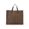 Brown suede tote bag detail showcasing premium soft texture and minimalist structured design. - Khaki
