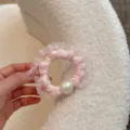 Dettaglio elastico capelli tulle rosa, fermacapelli elegante con perla per acconciature chic. - rosa pesca