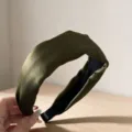 Detail close-up of dark green satin wide headband showing soft texture and high profile design. - Army Green
