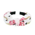 Detailed close-up of the Korean style fabric headband with charming flamingo print and knot. - Flamingo Style (FK-B043 Off-White)