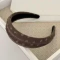 Brown wide headband for women, stylish high skull top hair accessory with floral texture. - Coffee