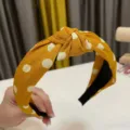 Yellow polka dot knotted headband, cute knitted hair hoop for women's daily wear. - Turmeric