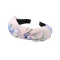 Detail view of the pink floral knotted headband, featuring a chic print and soft fabric. - Korean Pink Floral Style