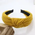 Mustard yellow knitted wide hair hoop with stylish cross knot design, perfect for daily wear. - Turmeric