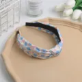 Dulce diadema de nudo floral para mujeres y niñas, elegante aro de pelo de tela versátil. - Azul