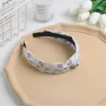 Diadema de tela con estampado floral y nudo, accesorio para el pelo versátil. - Púrpura