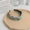 Mint green fabric headband with cute red watermelon print, knotted design for women everyday wear. - Watermelon Print / Green