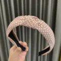 Pink polka dot knotted headband for women, stylish fabric hair hoop daily variant. - Pink