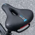 Ergonomic bicycle saddle with hollow breathable design, comfortable thickened cushion for MTB. - Saddle Only / Blue - Upgraded Handle - Shock Absorbing Ball Model
