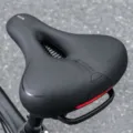 Black bicycle saddle, comfortable mountain bike seat with rear handle and shock absorption. - Saddle Only / Black - Upgraded Handle - Shock Absorbing Ball Model