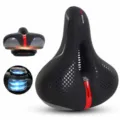 Ergonomic bicycle saddle with silicone padding and shock absorption for comfortable riding. - Single Saddle / Red