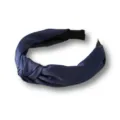 Close-up detail of the dark blue satin knotted headband showing the smooth fabric and wide design. - Navy Blue