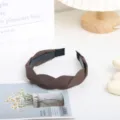 Cerchietto intrecciato marrone nordico da donna, elegante accessorio per capelli alto. - Marrone chiaro