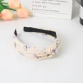 Butterfly floral printed knotted fabric headband for women, sweet casual hair accessory. - Nude Pink