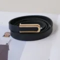 Black thin belt for women, stylish gold U-buckle design, versatile waist accessory for jeans. - Black