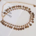 Vintage gold coin waist chain for women, ethnic tassel metal belt, stylish trousers dress accessory. - Gold