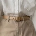 Minimalist women's belt with gold square buckle, versatile fashion accessory for trousers. - Beige